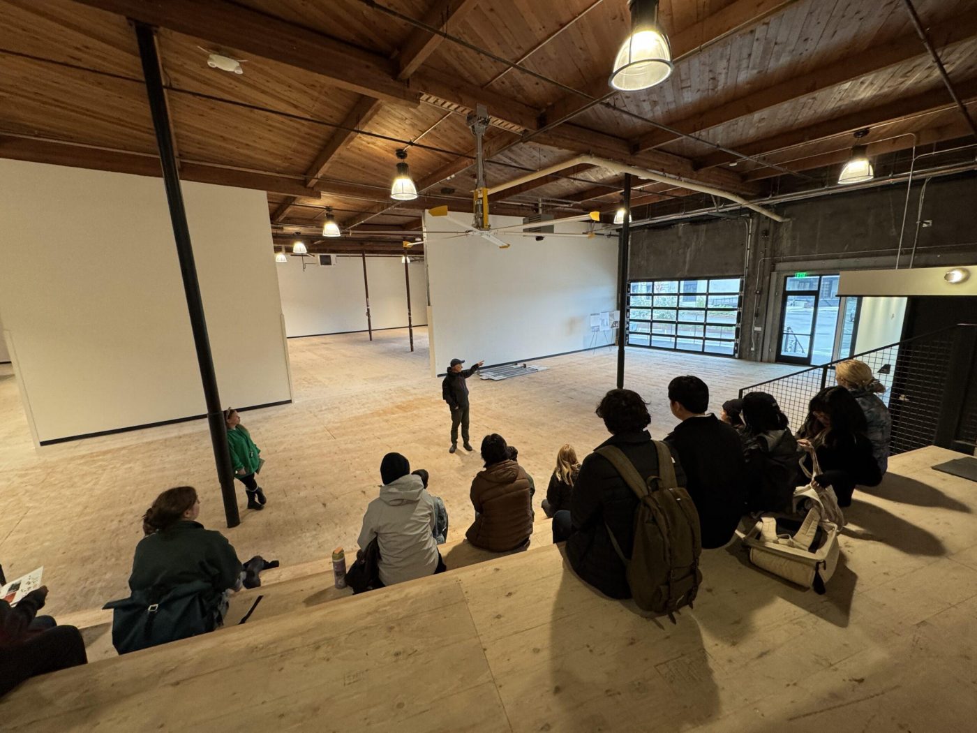 Students working on mid term design proposals with Jim Graham scaled 1